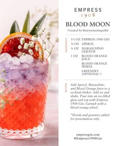 an orange and purple drink with ice on the rim, garnished with flowers