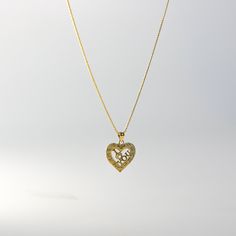 Own a tangible representation of love in the most elegant way. This 14K solid gold heart-shaped pendant is the most sophisticated way of showing love to your special someone. Whether that be yourself or a significant other. This gold heart pendant will captivate not only the eyes but also the heart of the person who will receive it. Made from the finest 14K solid gold material, this heart-shaped pendant is a real symbolism of luxury and of love. Make it yours and add it to your collection. This Elegant Hallmarked Heart Pendant Necklace, 14k Gold Heart Initial Pendant Necklace For Anniversary, 14k Gold Heart Necklace With Initial Pendant For Anniversary, Yellow Gold Heart Necklace With Birthstone For Anniversary, Gold Plated Heart Pendant Necklace Fine Jewelry, Wedding Heart Pendant Necklace With Birthstone, Wedding Heart Necklace With Birthstone Pendant, Gold Plated Heart Pendant Necklace In Fine Jewelry Style, Anniversary Yellow Gold Heart Necklace With Birthstone