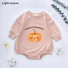 👼Pick a soft and comfortable Mama's Pumpkin romper for your little one! 🎃Celebrate your little one's first fall in this adorable 'Mama's Pumpkin' romper! This cozy, soft outfit is perfect for autumn adventures and makes a great gift for your little pumpkin. 💕The fabric of the clothing is cotton, very skin-friendly, and excellently crafted. ✔️ Ordering Instructions 1 - Please refer to the size chart images provided in the listing for details on available sizes, styles, and colors. 2 - Choose y Halloween Long Sleeve Onesie For Playtime, Long Sleeve Cotton Onesie For Halloween, Fall Long Sleeve Onesie With Letter Print, Fall Long Sleeve Letter Print Onesie, Cute Long Sleeve Onesie With Graphic Print, Cute Cotton Halloween Onesie, Cute Halloween Onesie For Playtime, Playful Long Sleeve Onesie With Letter Print, Playful Halloween Onesie With Cartoon Print