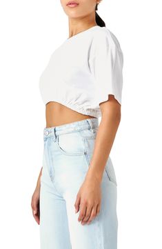 Top your high-waist styles with this staple cropped T-shirt crafted from pure cotton with a stretch elastic hem. Crewneck Short sleeves Lined 100% cotton with 93% polyester, 7% spandex contrast Hand wash, dry flat Imported Cotton Cropped Hem T-shirt For Summer, White Cotton Crop Top With Cropped Hem, Spring Cotton Crop Top With Elastic Waistband, White Relaxed Fit Crop Top With Cropped Hem, White Relaxed Fit Crop Top, Spring Cotton Crop Top With Cropped Hem, White Cropped T-shirt For Spring, White Cotton Cropped Hem Top, White Cropped Cotton Top