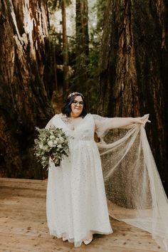 Plus size bride posed in a forest wearing a white celestial plus size wedding dress. Wedding Veil Alternatives, Wedding Cape Veil, Celestial Dress, Cape Veil, Draping Wedding, Unconventional Wedding, Celestial Wedding