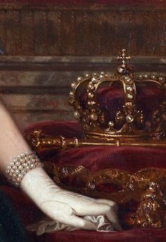 a painting of a woman's hand with a tiara on top of a red couch