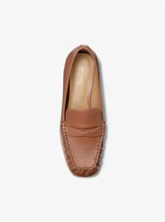 Designed with a classic penny loafer silhouette, our Carlson loafers are a timeless wardrobe essential. They’re made from rich smooth leather and finished with gathered top-stitch detailing. You’ll love the hint of polish they add to any look. Fitted Slip-on Moccasins For Workwear, Classic Brown Fitted Loafers, Brown Fitted Classic Loafers, Classic Spring Leather Loafers, Classic Leather Loafers For Spring, Classic Moccasins For Workwear In Fall, Classic Moccasins For Fall Workwear, Classic Fall Slip-on Moccasins, Classic Almond Toe Moccasins For Fall