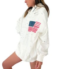 DESCRIPTION EACH PIECE IS MADE TO ORDER, HAND PAINTED BY GLORIA AND HER TEAM IN THEIR NYC STUDIO PRODUCT DESCRIPTION The perfect oversized white distressed hoodie. American flag painted on front chest, with USA painted on back in red, with blue outline. Signed @wrenandglory Due to each piece being hand painted, each piece might have slight differences. Limited edition. FIT Oversized, Super Comfy, Slouchy fit. Can be worn as a sweater or dress. One size fits most Measurements: Body Width 27", Len Spring Distressed Long Sleeve Hoodie, White Distressed Sweatshirt For Fall, Distressed White Long Sleeve Top, White Distressed Casual Sweatshirt, Distressed White Top For Fall, Distressed White Tops For Fall, White Distressed Tops For Fall, White Distressed Sweatshirt, White Distressed Long Sleeve Sweatshirt