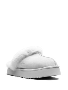 "Find UGG Disquette \"\"goose\"\" Slippers on Editorialist. light grey sheepskin/suede shearling lining embossed logo to the side round toe platform sole These styles are supplied by a premium and authenticated sneaker marketplace. Stocking only the most sought-after footwear, they source and curate some of the most hard to find sneakers from around the world." Goose Slippers, Cute Online Clothing Stores, Preppy Shoes, Cozy Style, Girly Shoes, Winter Fits, Clothing Stores, Pretty Shoes, Cozy Fashion