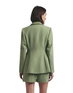 Become the ultimate fashionista with the Favorite Daughter The Favorite Blazer. In a stunning muted green Basil, The Favorite Blazer features a contoured waist for a flawless fit and elegant structure. Able to be paired with anything in your wardrobe--you'll fall in love!