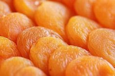 closeup of oranges that have been peeled and are ready to be used as garnishes