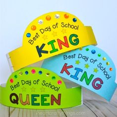 three paper crowns with the words best day of school, king and queen on them