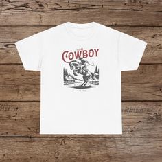 giddyup Retro Letter Print Tops For Rodeo, White Crew Neck T-shirt For Rodeo, White Short Sleeve T-shirt For Rodeo, White Screen Print T-shirt For Rodeo, Cotton Rodeo Shirt With Letter Print, White Graphic Print Shirt For Rodeo, Cotton Graphic Print Shirt For Rodeo, Cotton Shirt With Letter Print For Rodeo, Retro Rodeo T-shirt With Screen Print