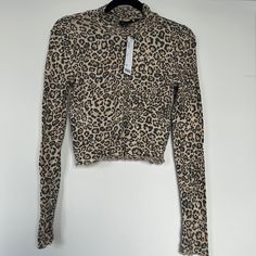 Urban Outfitters - Out From Under Crop Top Nwt Cheetah / Leopard Print Beige Long Sleeve Top From Urban Outfitters, Urban Outfitters Beige Long Sleeve Tops, Urban Outfitters Beige Tops For Fall, Beige Urban Outfitters Tops For Fall, Urban Outfitters Tops, Leopard Print, Urban Outfitters, Crop Top, Womens Tops