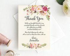 a wedding thank card with flowers on it