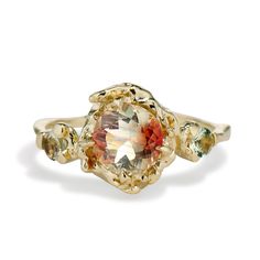 This ring is ready to ship in 14K Yellow Gold size 7. Please allow up to 4 weeks for any other size option. For the made to order listing, visit: %%GLOBAL_ShopPathSSL%%/naples-sunstone-trio-ring/ Our 14k yellow gold, size 7. Naples Oregon Sunstone Trio Ring is ready to ship, allowing you to receive your dream engagement ring in no time at all. Sparked by a sunset stroll along the sandy beaches of Maine, our Naples Oregon Sunstone Trio Ring provides dramatic and glimmering depth to any ensemble. Winterberry Holly, Blue Sunstone, Contour Ring, Oregon Sunstone, Ring Guide, Trio Ring, Twig Ring, Inner Light, Summer Solstice