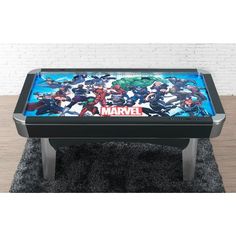 a game table with an image of the avengers team on it's top and bottom