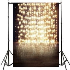 a photo studio with lights on the wall