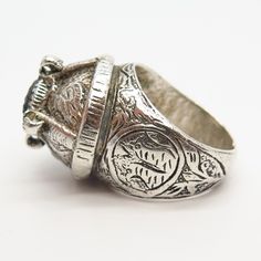 925 Sterling Silver Antique Ethnic Design Wide Massive Ring Size 9 3/4 Weight: 21.6g WELCOME TO PAWN SHOP We are an actual pawn shop and have been in business for over 25 years. Since 1990, our establishment has been serving a variety of clients by providing them with short term cash solutions and options of liquidity regarding their treasured heirlooms. Acknowledging that today′s customers are very sophisticated and are looking for a variety of investments, our acquisitions are hand-picked for Unique Engraved Ring For Collectible, Antique Silver Engraved Ring, Antique Sterling Silver Engraved Ring Stamped 925, Traditional Silver Engraved Ring Collectible, Ceremonial Heirloom Silver Engraved Ring, Antique Silver Rings For Ceremonial Occasions, Traditional Silver Engraved Collectible Ring, Silver Heirloom Ceremonial Rings, Traditional Silver Engraved Ring Oval Shaped