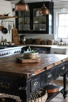 a kitchen island with baskets on it in front of an oven