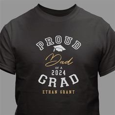 Support your graduate with our Personalized Proud Family of Grad T-Shirt. Personalize with any title, year and name. Great for family members to wear to any graduation ceremony or party! T-Shirt Details: Pre-Shrunk 100% Cotton Machine Washable Adult Sizes S-4XL Item #319219X Cotton Crew Neck Tops For Graduation Party, Graphic Print Crew Neck Top For Graduation Party, Black School Spirit Tops For Graduation, Black School Spirit Top For Graduation, Black Tops For Graduation With School Spirit, Crew Neck Tops With Letter Print For Graduation Party, Family Graduation Shirts, Black Tops With Letter Print For Graduation Party, Black Crew Neck Top For Graduation Party