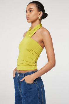 Multi-way Halter Neck Top For Night Out, Fitted Elastane Halter Top For Spring, Chic Multi-way Summer Tops, Chic Multi-way Tops For Summer, Chic Multi-way Halter Top For Night Out, Versatile Stretch Halter Top With Tie Back, Fitted Multi-way Halter Top For Summer, Versatile Fitted Halter Neck Top, Summer Multi-way Halter Neck Top