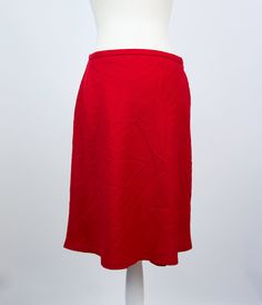 "- Classic red A-line mini skirt - Excellent condition (please see pictures) - 100% virgin wool, acetate lining - Tag size S (please see measurements) Measurements (flat): Waist: 35 cm / 13.8 inches Length: 55 cm / 21.7 inches Bottom width: 60 cm / 23.6 inches RESERVATIONS are available, please contact me for details. SHIPPING INFO: Shipping price in the listing is for the \"Standard Latvian post shipping\". Includes tracking info and takes: * 5 business days within European Union * 10-15 busine Red Winter Skirt With Relaxed Fit, Red Pleated Knee-length Mini Skirt, Red Relaxed A-line Skirt, Red Relaxed Fit Knee-length Mini Skirt, Red A-line Relaxed Skirt, Red Flowy Skirt For Workwear, Relaxed Red A-line Skirt, Flowy A-line Skirt In Red, Flowy Red A-line Skirt