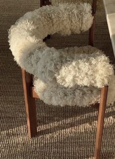 a chair that has some kind of furry thing on it