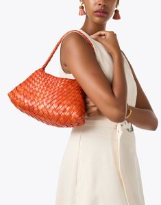 Dragon Diffusion fuses ancient techniques with modern design to create fashion-forward bags, like the Rosanna. It's woven from leather strips to form a tapered silhouette, perfect for adding flair to this season's ensembles. Carry it on your shoulder with your favorite outfits to instantly elevate any look. Chic Evening Shoulder Bag With Interwoven Design, Designer Woven Shoulder Bag For Evening, Designer Shoulder Bag With Interwoven Design For Shopping, Modern Woven Shoulder Bag, Modern Leather Shoulder Bag With Interwoven Design, Chic Handwoven Shoulder Bag For Evening, Modern Shoulder Bag With Interwoven Design For Shopping, Chic Handwoven Evening Shoulder Bag, Chic Evening Handwoven Shoulder Bag