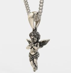 ★ Baby Angel Pendant ★  Handcrafted Baby Angel pendant/necklace for Men and Women. * Materials/Finishes ➤ Artificially Aged (Black/Grey Oxidized) Silver 925 * Dimensions ➤ ~ 3.0 x 1.9 x 1.0 cm (~ 1.2 x 0.7 x 0.4 inches)/Bail: Suitable for up to ~ 4.5 mm (~ 0.18 inches) Chain * Weight: ~ 8 grams (in Silver 925) ----------------------------------------------------------------------------- IMPORTANT NOTES: ----------------------------------------------------------------------------- ➤ When buying f Angel Pendant Necklace, Angel Necklace, Angel Pendant, Precious Jewels, Necklace For Men, Baby Angel, Oxidized Silver, Rose Gold Color, Stainless Steel Chain