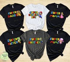 four shirts with the words super hero and mario on them