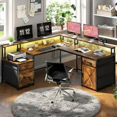 an office desk with two computer screens on it and a rug in front of the desk