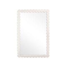 a mirror with scalloped edges on a white background, it's reflection is in the frame