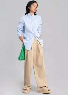 Color: Blue Stripe Woven shirting fabric Regular fit Rounded collar Curved hem Button cuffs Button front closure 96% Polyester 4% PU Dry Clean By The Frankie Shop. Imported Product Measurements: S- 17" Shoulder, 40" Bust, 27.5" Length M- 17.5" Shoulder, 42" Bust, 28" Length L- 18" Shoulder, 44" Bust, 28.5" Length XL- 18.5" Shoulder, 46" Bust, 29" Length Model is 174cm/ 5'8" wearing size S Paris Store, Denim Suit, Shirting Fabric, The Frankie Shop, Frankie Shop, Paris Woman, Leather Texture, Swimwear Accessories, Blue Stripes