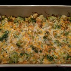 a casserole dish with broccoli and cheese