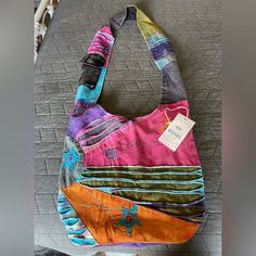 Nwt From Gift Shop. The Fun Bag Has A Velcro Pocket Conveniently On Strap, Plus An Additional Interior Zip Pocket. Entire Bag Zips Closed Plus Button Closure. Wide Comfortable Strap. Great For Travel, Carryon, Diaper Bag Or Everyday! Uniquely Artisan Made! Multicolor Hobo Bag With Zipper For Travel, Multicolor Hobo Bag With Removable Pouch, Multicolor Crossbody Hobo Bag For On-the-go, Multicolor Large-capacity Rectangular Hobo Bag, Multicolor Zipper Pocket Bag For On-the-go, Hobo Bag, Fun Bags, Pink Purple, Gift Shop