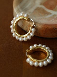 Elegant, timeless and beautiful — House of Pearls’ Circle Pearl Earrings are the perfect way to add a touch of sophistication to your formal look. Crafted with a timeless gold vermeil finish, these earrings feature a perfect circle of lustrous pearls that shimmer gracefully in the light. Whether you wear them with casual wear or a special occasion look, these earrings add a touch of poise to any ensemble. Details: Style ADiameter: 2.8cm Weight: 2.5g per earring Style BDiameter: 3.5cm Weight: 9.6 Copper Plating, Perfect Circle, Hoop Earrings Gold, Pearl Hoop Earrings, A Perfect Circle, Classic Gold, Copper Plated, Gold Hoops, Modern Elegance