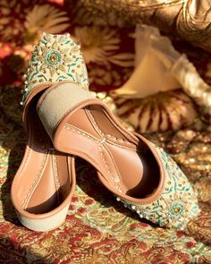 Elevate your attire with our Beige Jutti - a perfect blend of traditional craftsmanship and modern style. Handcrafted for quality and comfort, these juttis are ideal for weddings, celebrations, and daily wear. From neutral hues to delicate pearl embellishments, explore our selection for a touch of elegance. Bridal Jutti, Punjabi Design, Punjabi Jutti, Ethiopia, Modern Style, Daily Wear, Embellishments, Weddings, Design