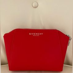 Brand New In Box Givenchy Faux Leather Pouch Bag. Measures: 7"W X 4.5" H X 3"D - Cherry Red In Color - Silver Zipper & Givenchy Logo For The Zip-Pull - Large Givenchy Logo Embossed On Frontside - Mini Givenchy Logos Throughout Interior Modern Red Bags With Zipper Pouch, Red Cosmetic Bag With Zipper Closure - Gift, Red Rectangular Cosmetic Bag With Zipper, Red Rectangular Cosmetic Bag With Zipper Closure, Chic Red Rectangular Pouch, Rectangular Red Cosmetic Bag With Zipper, Rectangular Red Cosmetic Bag With Zipper Closure, Red Cosmetic Bag With Zipper, Red Zipper Cosmetic Bag