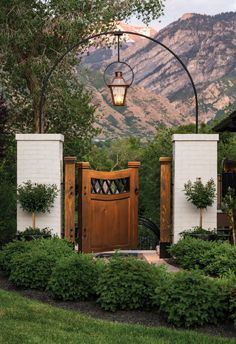 an entrance to a home with mountains in the background