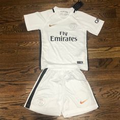 New Nike Boys Soccer Outfit. The Size Says 22 And I’m Not Sure If It’s A Size 6 Boys Or Seven But Here Is The Measurements Armpit To Armpit Is 14 1/2 Inches Back Length 20 1/2 Inches Shorts Waist Measures 9.5 Inches Length 14.75 Inches White Short Sleeve Sports Sets, White Short Top For Playwear, Nike White Casual Sets, Nike Casual White Sets, White Nike Casual Sets, Casual White Nike Sets, White Nike Playwear Sets, Nike White Summer Sets, White Nike Summer Sets