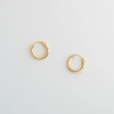 Gold Hinge Hoops - Machete Jewelry and Accessoreis Everyday Recycled Gold Huggie Earrings, Classic Everyday Hoop Earrings In Recycled Gold, Everyday Round Huggie Earrings In Recycled Gold, Minimalist Everyday Brass Huggie Earrings, Gold-tone Small Hoop Jewelry For Everyday, Everyday Minimalist Brass Huggie Earrings, Everyday Yellow Gold Hoop Earrings From Recycled Gold, Everyday Yellow Gold Recycled Hoop Earrings, Everyday Yellow Gold Hoop Earrings In Recycled Gold