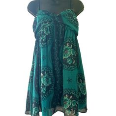 Brand New With Tags Free People Sun Dress With Pockets! Perfect For Spring And Summer Time! Teal & Navy Blue Paisley And Floral Design. Sheer Like Material, With Fully Lined Navy Blue Liner Beneath. “Navy Combo”. Spaghetti Straps That Are Adjustable. A Sweetheart Type Of Neckline With Ruching. Smocking In Back For Stretch. Take This On Your Summer Vacation And Even Wear It Over Your Swimsuit! Ready For Festival Wear As Well. Size Medium. Nwt. Casual Printed Turquoise Dress, Casual Turquoise Printed Dress, Blue Sundress With Pockets For Vacation, Beach Sundress With Pockets, Mini Length, Beach Mini Sundress With Pockets, Green Summer Sundress With Pockets, Green Sundress With Pockets For Summer, Green Summer Dresses With Pockets, Casual Green Printed Sundress