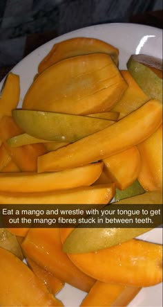 sliced mangoes on a white plate with text