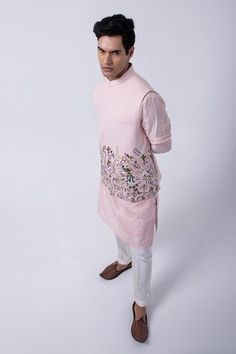 Baby pink bam silk kurta with front buttoned placket. Comes with ivory cotton silk pyjama and a suiting bundi jacket with floral, thread and sequins embroidered peacock in a garden. - Aza Fashions Fitted Pink Embroidered Nehru Jacket, Ceremonial Nehru Jacket With Cutdana Detailing, Pink Luxury Nehru Jacket, Pink Embroidered Nehru Jacket Kurta, Luxury Off-white Nehru Jacket With Cutdana Detailing, Embroidered Peacock, Pajama Pattern, Silk Kurta, Nehru Jacket