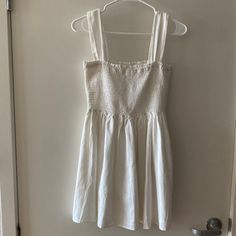 White Linen Smocked Mini Dress New Without Tags. Never Been Worn. Size Small But Fits S-M Very Flattering Fit, Comfy Straps, And Double Lined, Perfect For Picnics Or Vacation. Fitted Midi Sundress With Smocked Bodice, Fitted Sundress With Smocked Back For Day Out, Summer Cotton Smock Mini Dress, Cotton Sundress With Smocked Back For Brunch, White Fitted Sundress With Smocked Back, Summer Mini Dress With Smocked Bodice For Daywear, Fitted White Sundress With Smocked Back, Summer Smocked Mini Dress With Smocked Back, Summer Smocked Dress With Smocked Bodice, Mini Length