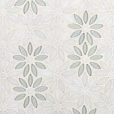 a white and grey wallpaper with flowers on it