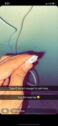 a person holding a remote control in their hand with the caption'types c - ka girl chargeh nai hota '