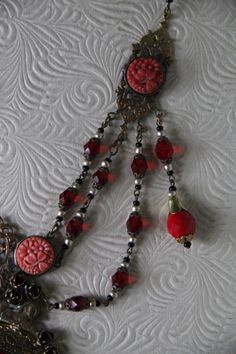 "This listing is for An Art Nouveau Antique 1930's Czech Vibrant Red Color Glass bead, and delicately carved celluloid Festoon Lariat Necklace and Earring Set* A true One of a kind set! The pieces show the patina of time, which makes this a testimonial of a past era. Glamorous and classic chic. Here are the details of this specific gem exactly as shown on pictures: kindly regard that this piece does show wear on the largest glass centerpiece, but otherwise all else is in superb pre_loved conditi Art Nouveau Antiques, Glass Centerpieces, Statement Art, Vintage Navajo, Necklace And Earring Set, Classic Chic, Earring Jewelry, Lariat Necklace, Czech Glass Beads