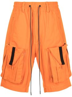 Orange cotton Zipoff cargo shorts from MOSTLY HEARD RARELY SEEN featuring elasticated waistband, drawstring fastening waist, two side zip-fastening pockets, two front flap pockets, two rear welt pockets, knee-length and belt loops. | Mostly Heard Rarely Seen Zipoff cargo shorts Bermuda Cargo, Running Shorts, Overall Shorts, Mens Bottom, Welt Pocket, Flap Pocket, Short Outfits, New Outfits, Cargo Shorts