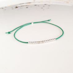 Minimalist, wearable and delicate silver multicolor thread bracelet available in several colors. Length: 20cm adjustable knot. Width: 2mm. Fully adjustable, Handmade in Spain. More colors available in this product => https://www.etsy.com/listing/845364478/tiny-simple-cord-sterling-silver-wish Ideal for a gift and for combinate with other bracelets. All our products are presented in a white organza bag. ♡ Made with love in Valencia ♡ ----------------------------- Discover the NICTE bracelets c Cheap Minimalist Bracelet With Adjustable Cord, Minimalist Silver Friendship Bracelets, Minimalist Friendship Bracelets With Round Beads, Minimalist Sterling Silver Friendship Bracelets, Minimalist Handmade Friendship Bracelets, Adjustable Friendship Bracelets With Silver Beads As Gift, Minimalist Sterling Silver Bracelets With Adjustable Length, Minimalist Silver Friendship Bracelet With Tiny Beads, Minimalist Adjustable Friendship Bracelets