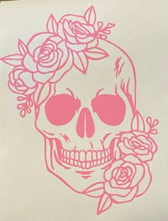 a skull with flowers on its head is shown in pink stencil from the side