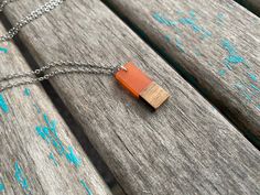 This lovely necklace is the perfect gift for anyone, or for yourself! The wood and orange pendant measures just under 1 inch in length and is strung on your choice of chain. READ BELOW FOR ANSWERS TO COMMONLY ASKED QUESTIONS: Q: Can I include a note in the package so that I can send it directly as a gift? A: Absolutely, it's no problem at all to include a short note for you in the package. Just type me a quick note during checkout of what you want the note to say. Q: If I place an order today, h Orange Rectangular Jewelry As Gift, Minimalist Orange Necklace As Gift, Orange Necklace With Adjustable Chain For Gift, Orange Necklace With Adjustable Chain As Gift, Short Note, Art Deco Necklace, Lovely Necklace, Main Page, Jewelry Bags