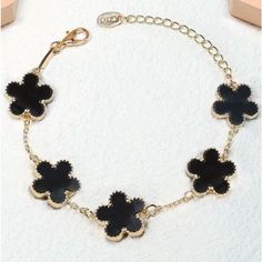 Brand New. Adjustable And Fits Most Sizes. Chic Black Flower Jewelry, Black Casual Jewelry For Spring, Casual Black Jewelry For Spring, Spring Gift: Black Jewelry, Elegant Black Spring Jewelry, Trendy Black Flower-shaped Jewelry, Clover Bracelet, Womens Jewelry Bracelets, Gold Plate